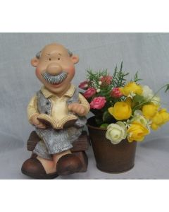 1015 Man Reading Book and Citronella Candle